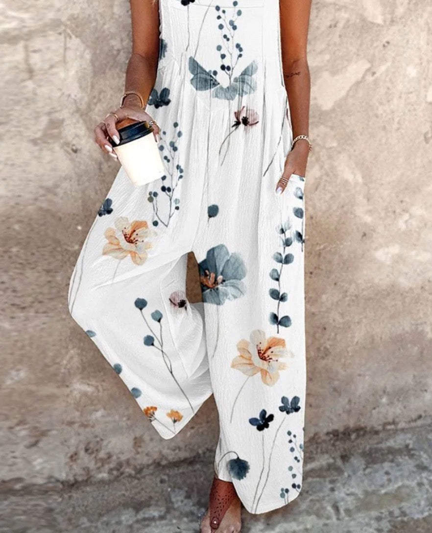 Fiona floral dungarees in white, close-up of printed wide legs