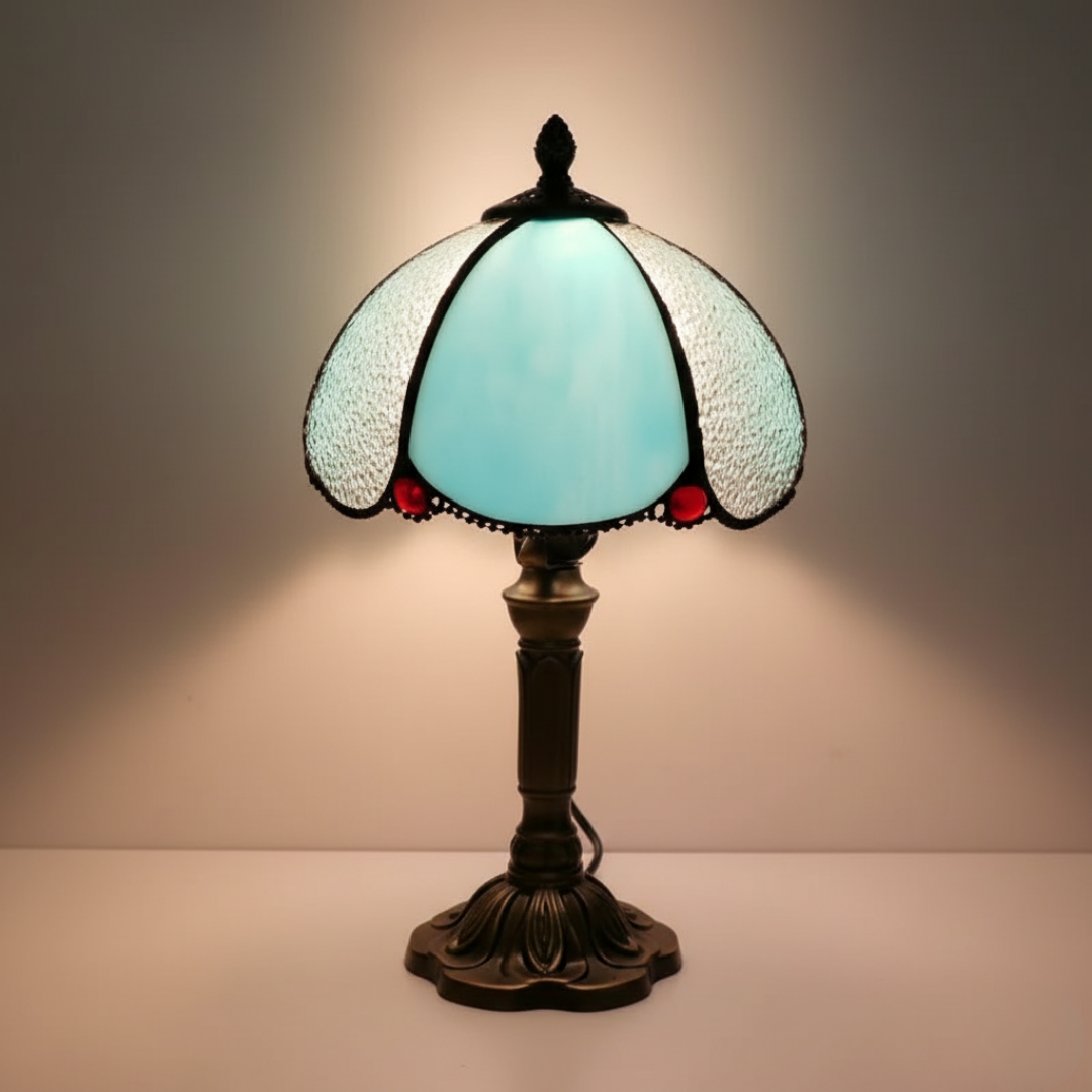 Blue Butterfly stained-glass table lamp in turquoise and cream, lit front view
