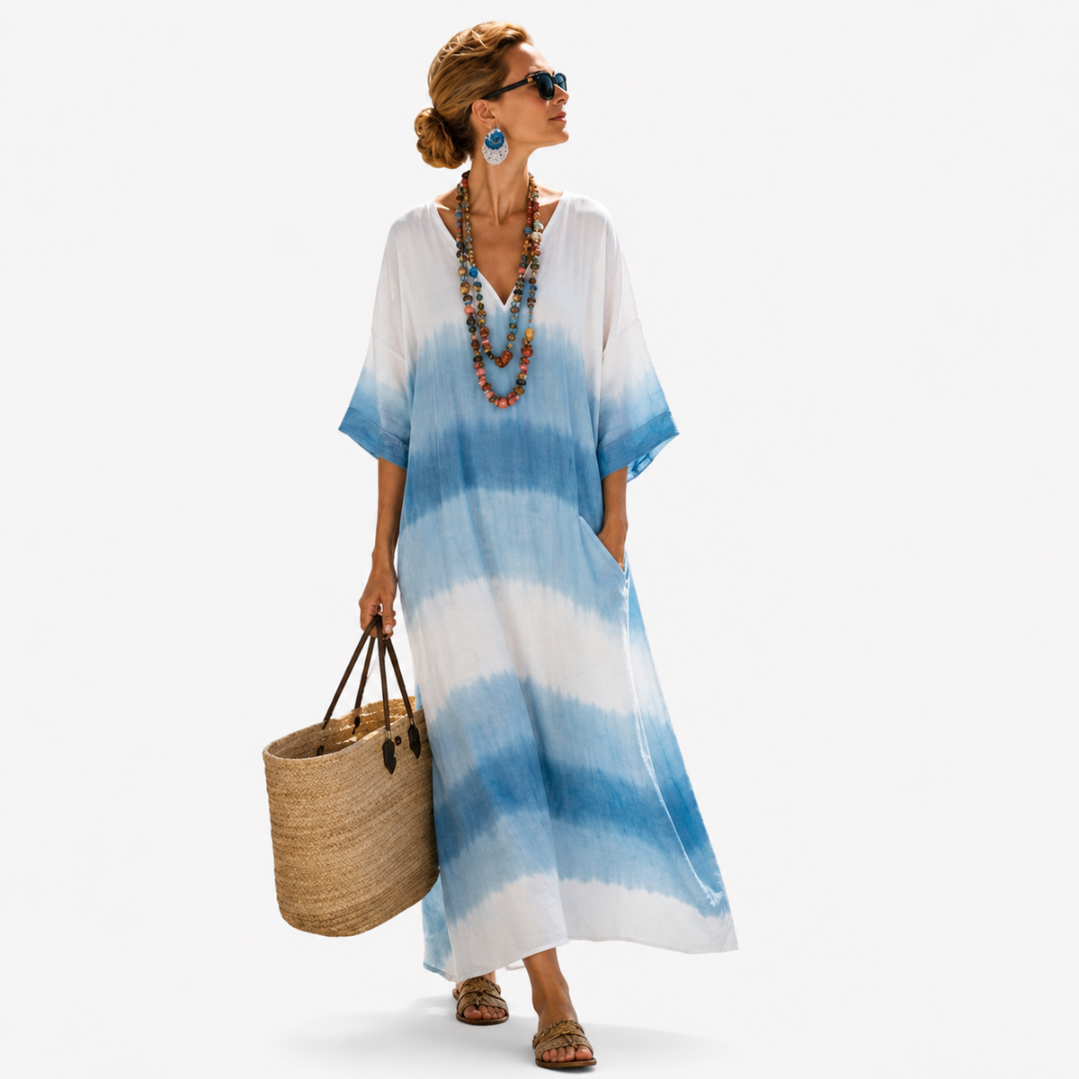 Long kaftan in blue and white gradient stripes, full-length front view