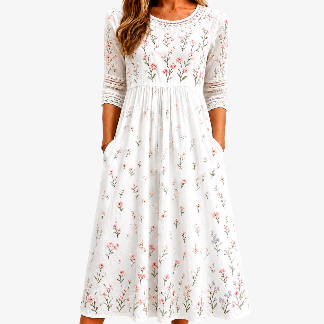 Ivory wildflower print pocket midi dress with three-quarter sleeves, front view