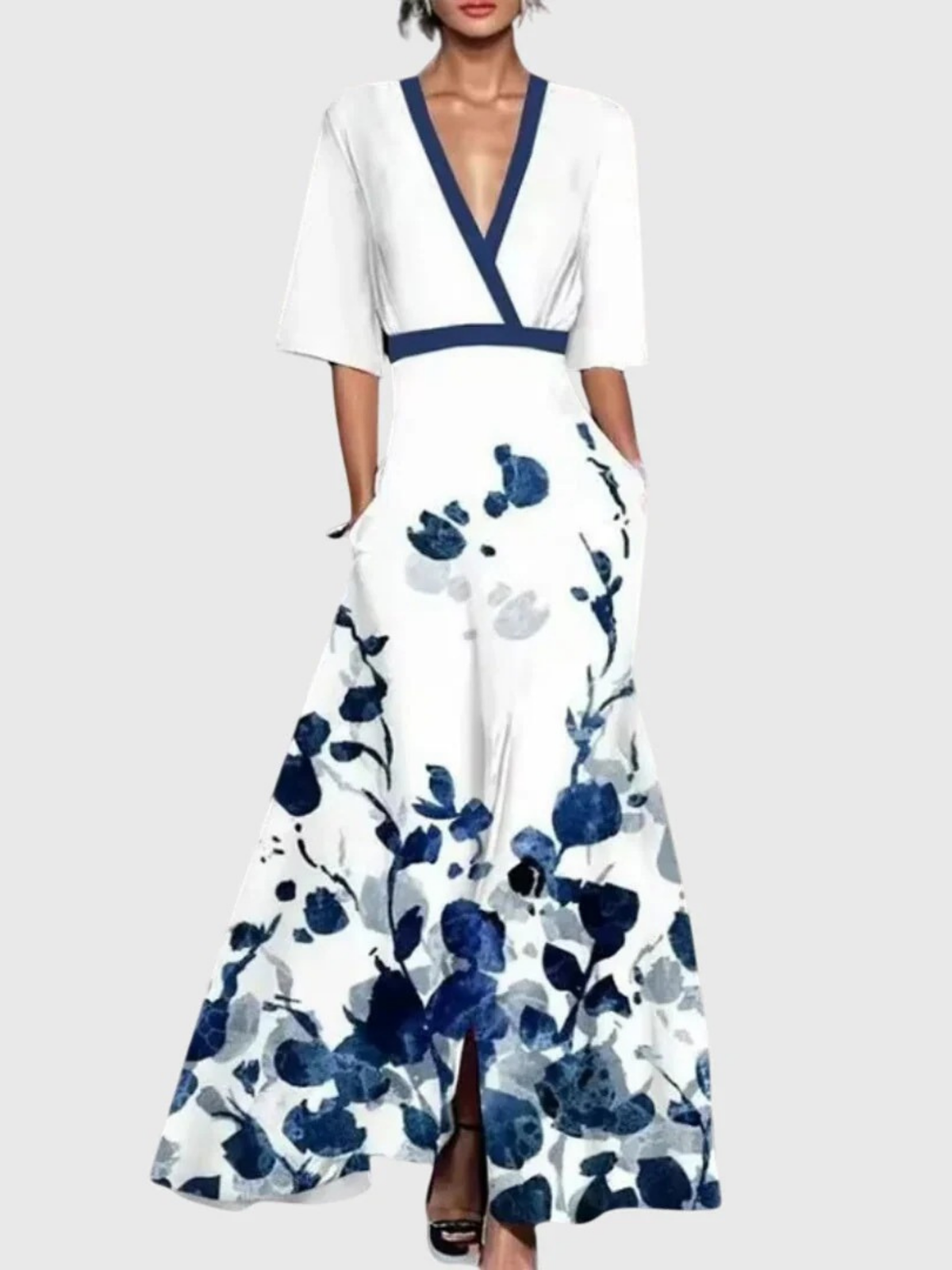 Candice maxi dress in white with blue floral hem, full-length front view