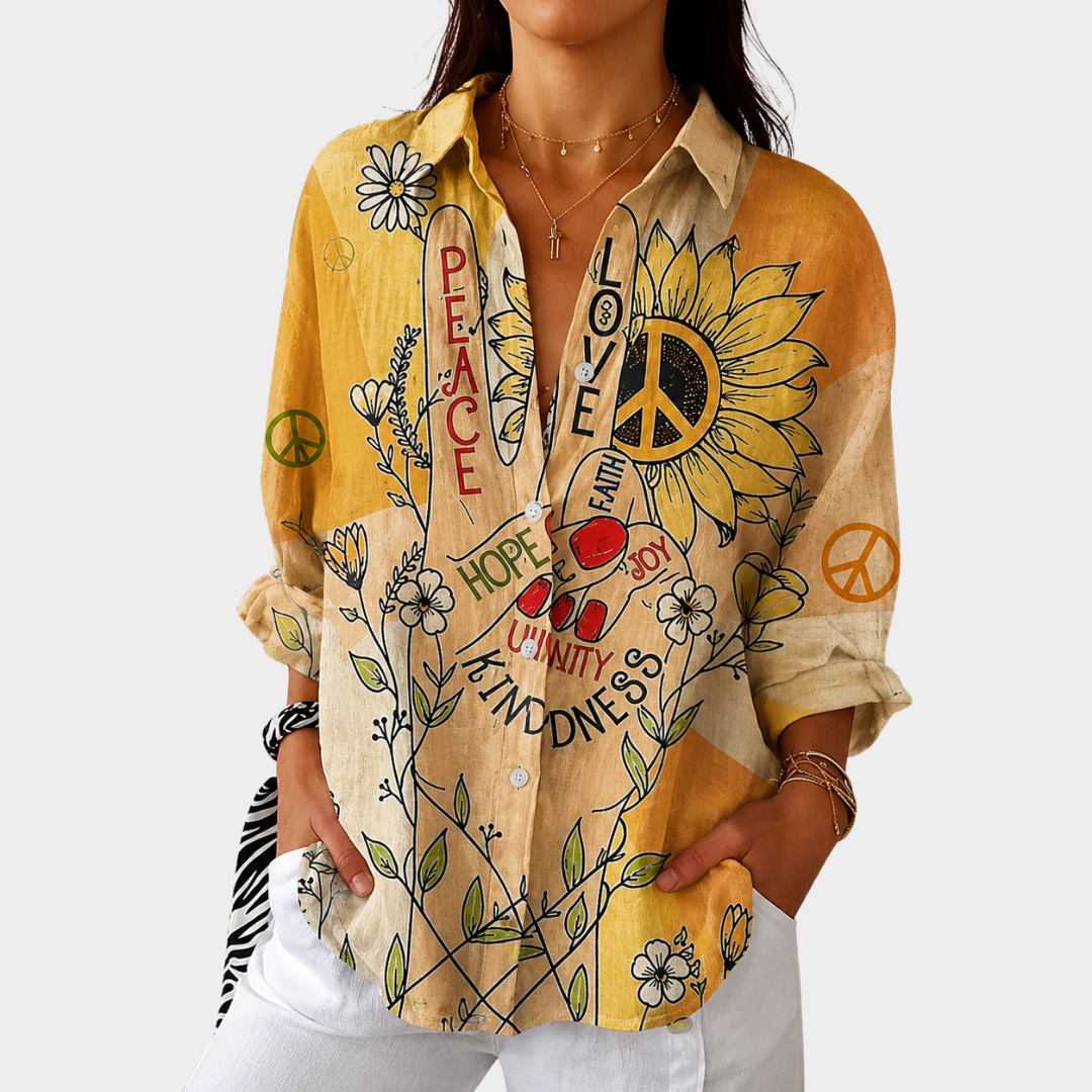 Colourful summer print blouse in golden yellow with sunflower and word print, front view