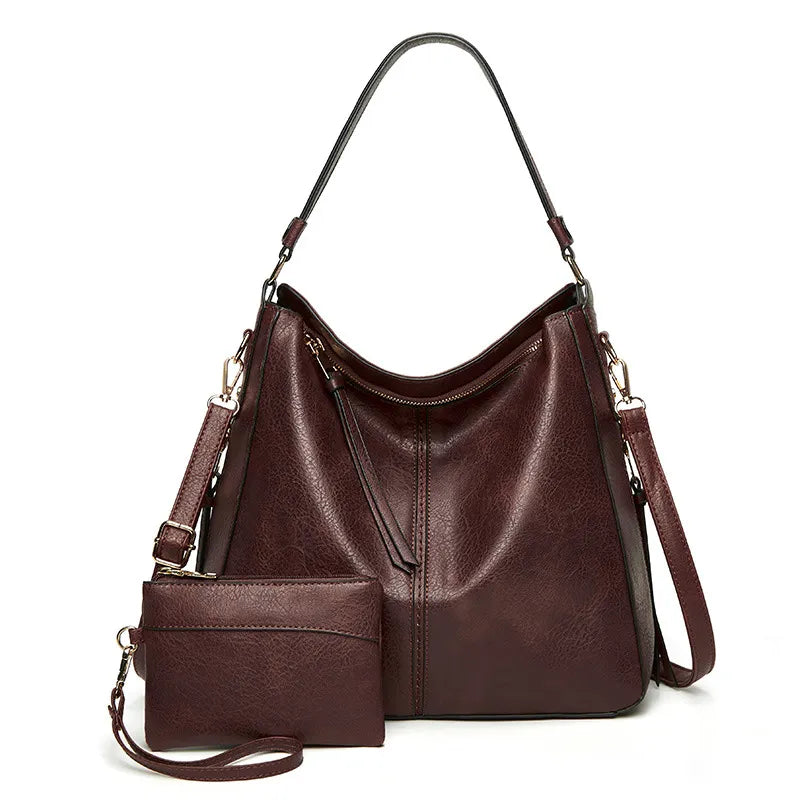 Edith vintage shoulder bag in dark brown with zip pouch, front view