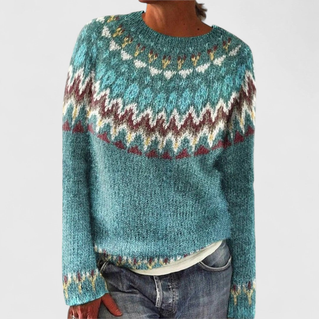 Victoria patterned knit sweater in teal, front view worn with jeans
