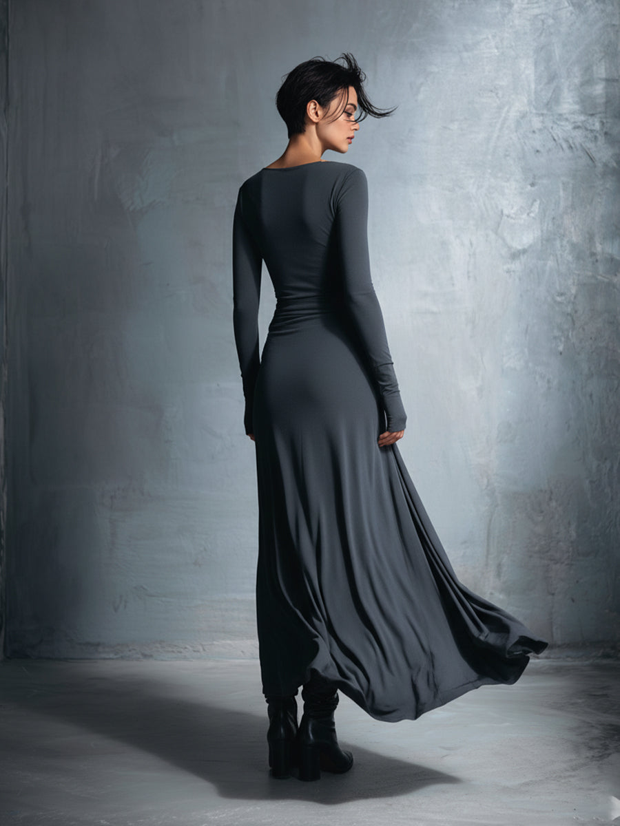 Yasmina maxi dress in grey, back view with flowing skirt