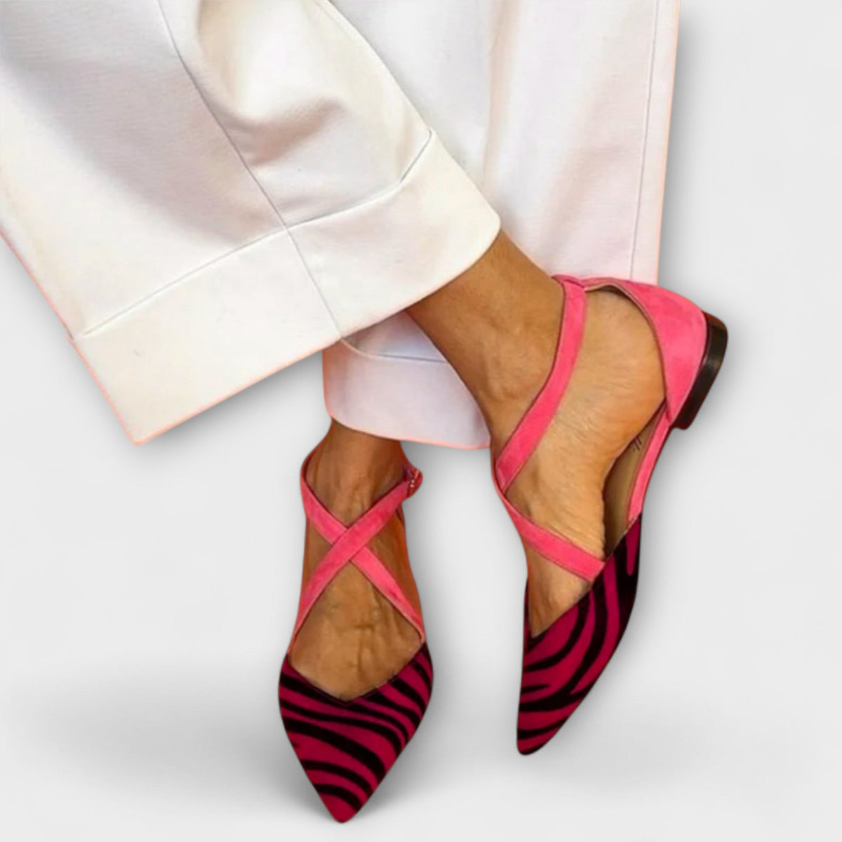 Gabrielle band detail loafers in dark pink zebra print, worn front view