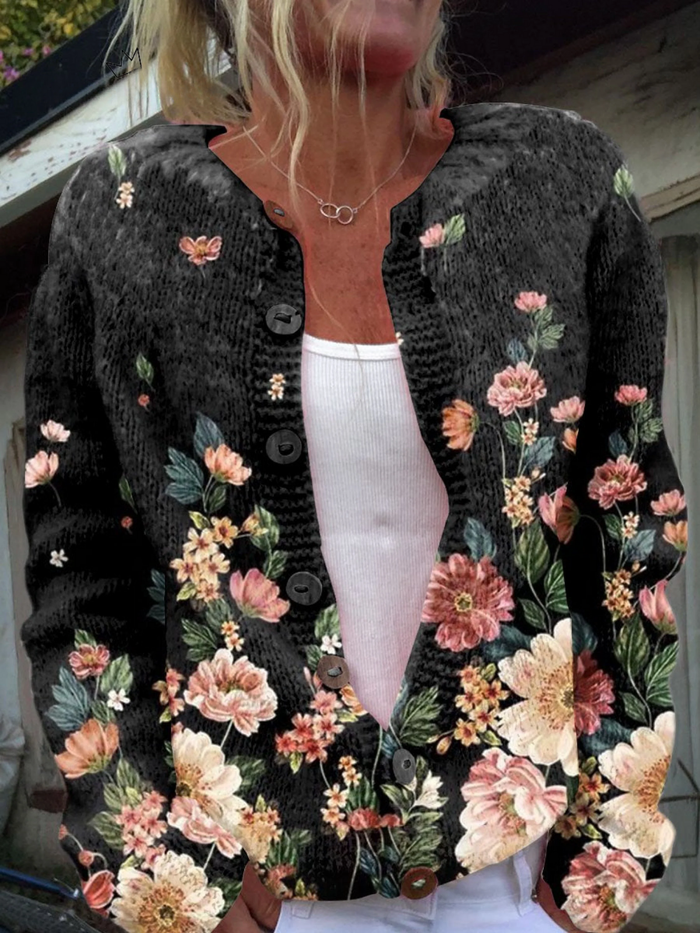 Kivara vintage floral cardigan in black with pink and cream blooms, front view