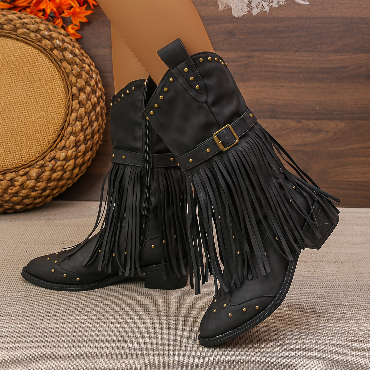 Aurelia western boots in black, front view with studs and fringe
