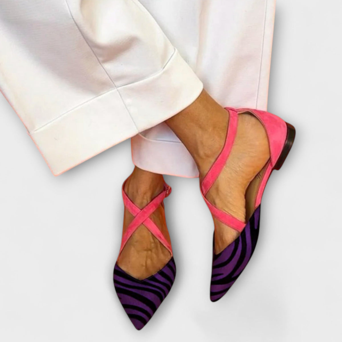 Gabrielle band detail loafers in purple zebra print, worn front view