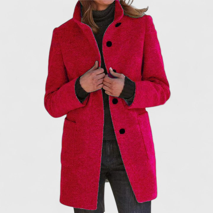 Harriette elegant coat in red, front view with patch pockets