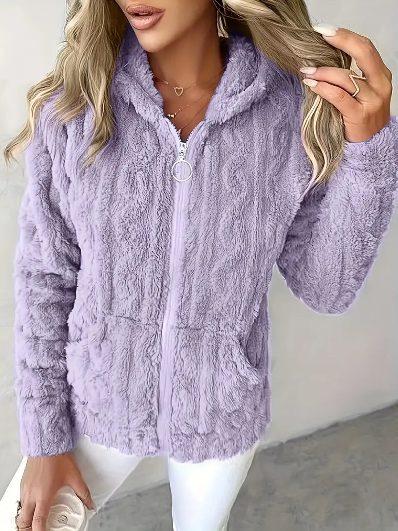 Ruth classic zip-up hoodie in purple, front view worn with white jeans