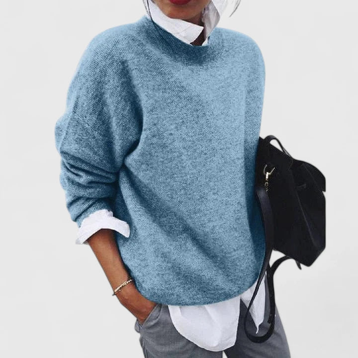 Isabellynn relaxed knit sweater in blue, front view with layered shirt