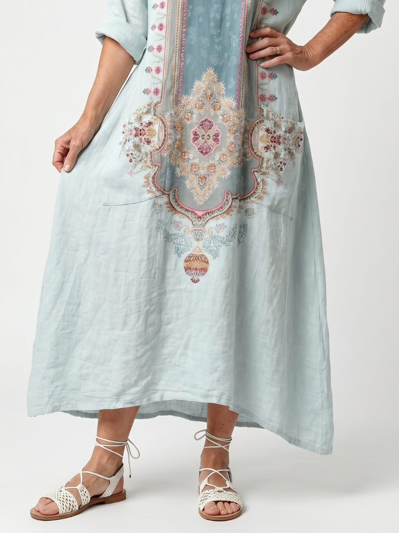 Kassiani midi dress in sky blue, close view of embroidered panel and hem