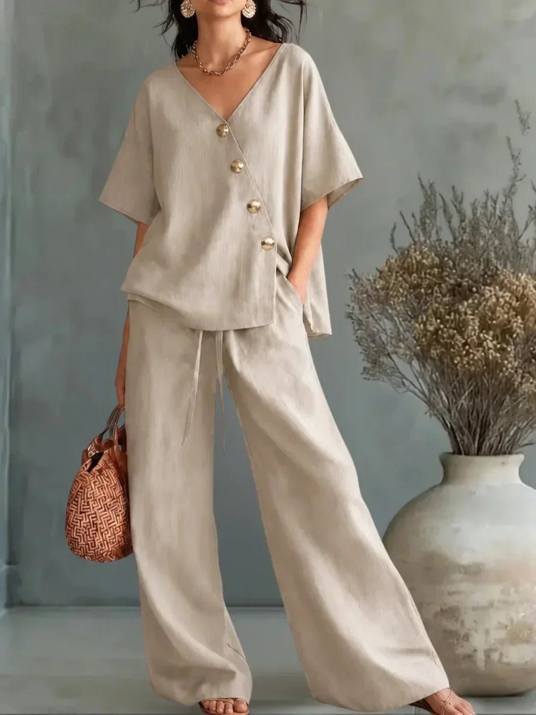 Celia V-neck button set in beige, full-length front view