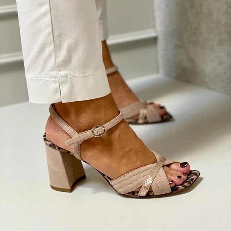 Khaki peep-toe block heels with leopard footbed, side view on model