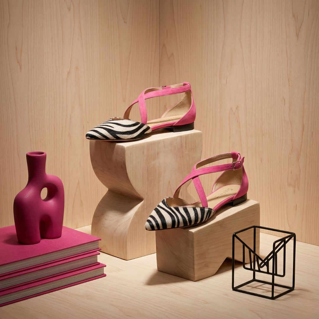 Amelia strappy ballet pumps in pink and zebra stripe, side view on display blocks