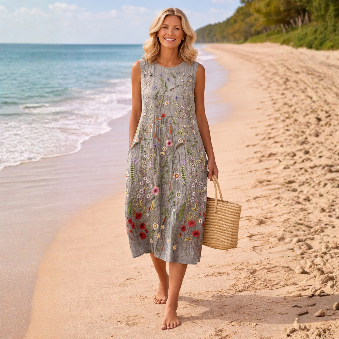 Cara wildflower midi dress in grey, full-length view on the beach