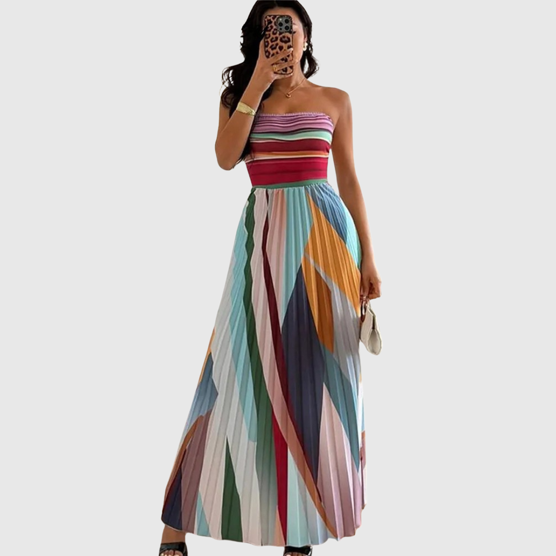 Isola maxi dress in pastel multicoloured pleats, worn full-length