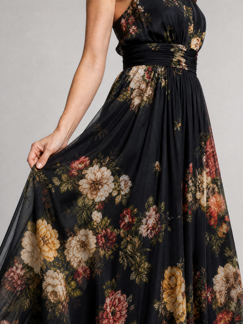 Sior midi dress detail showing ruched waist and floral skirt