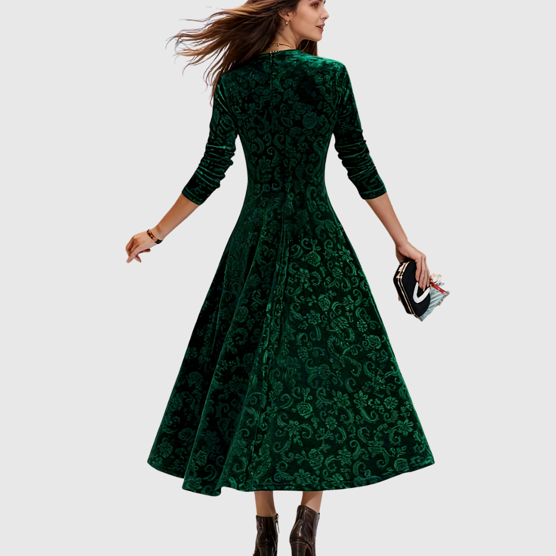 Grece velvet dress in green, back view with full skirt