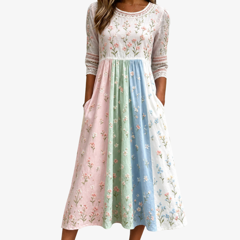 Pastel meadow floral pocket midi dress in blush, green and blue, front view