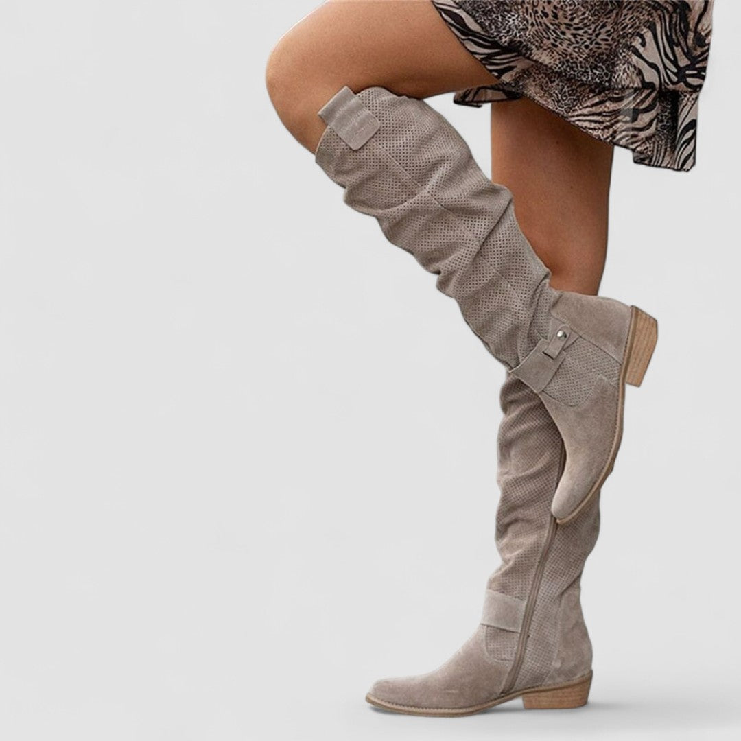 Georgiana slouch knee boots in khaki, walking side view