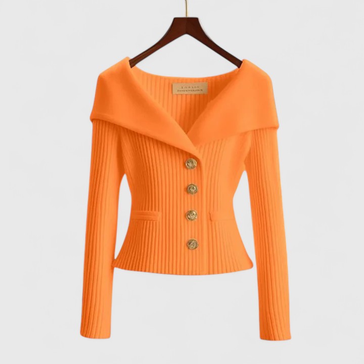 Elara soft knit cardigan in orange, front view on hanger