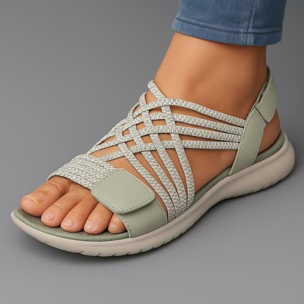 Sanarita sandals in sage green, worn side view