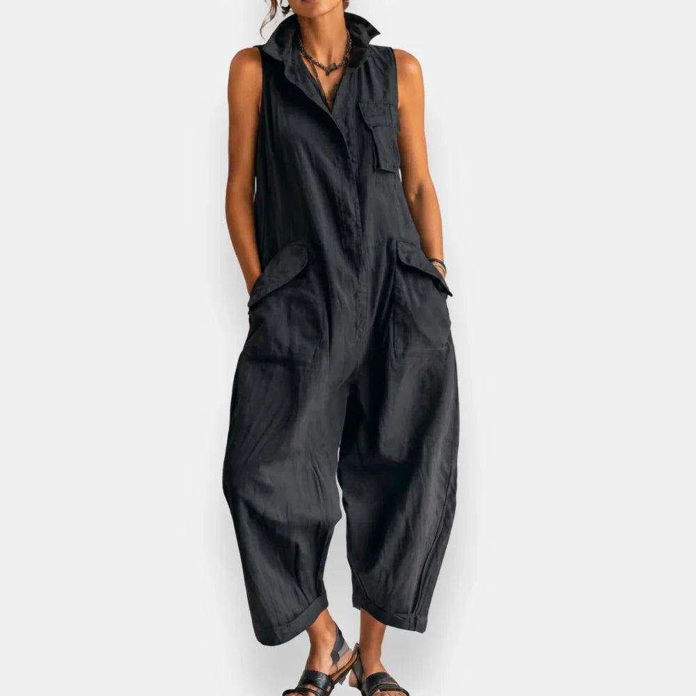 Ryker sleeveless cargo jumpsuit in black, front view with hands in pockets