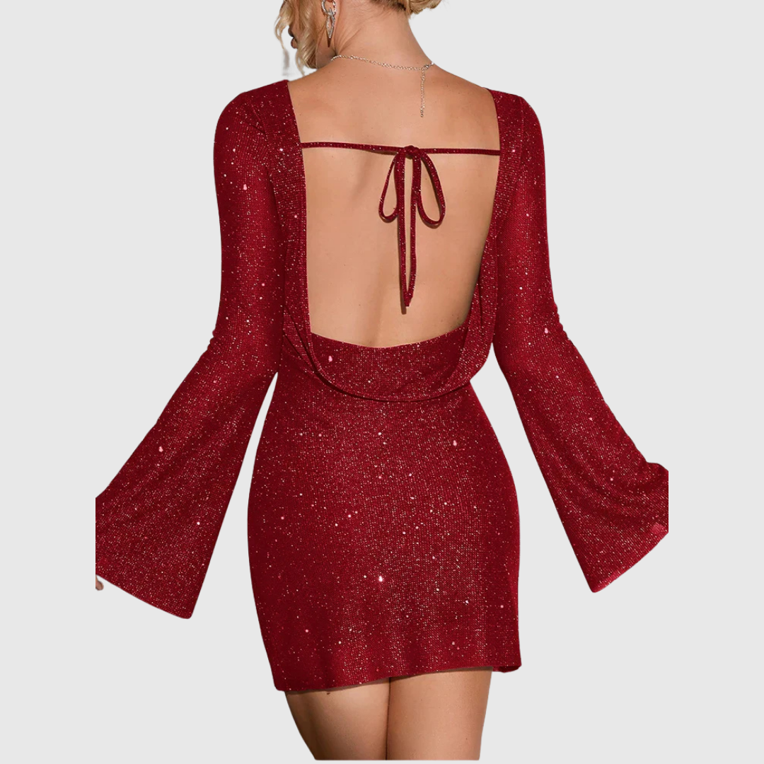 Isadora shimmering mini dress in red, back view with tie fastening
