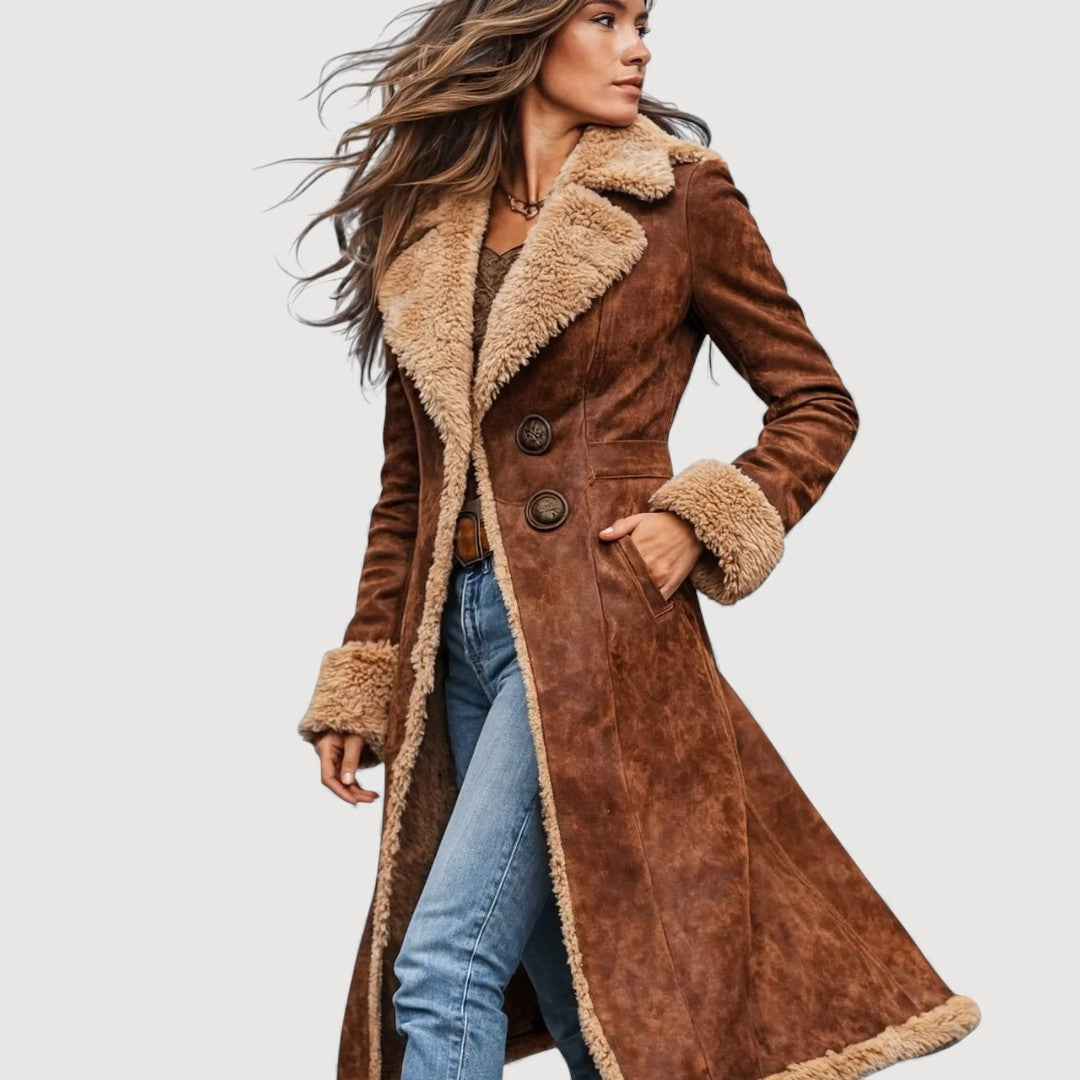 Arielle shearling coat in brown, side view showing longline cut and cuffs