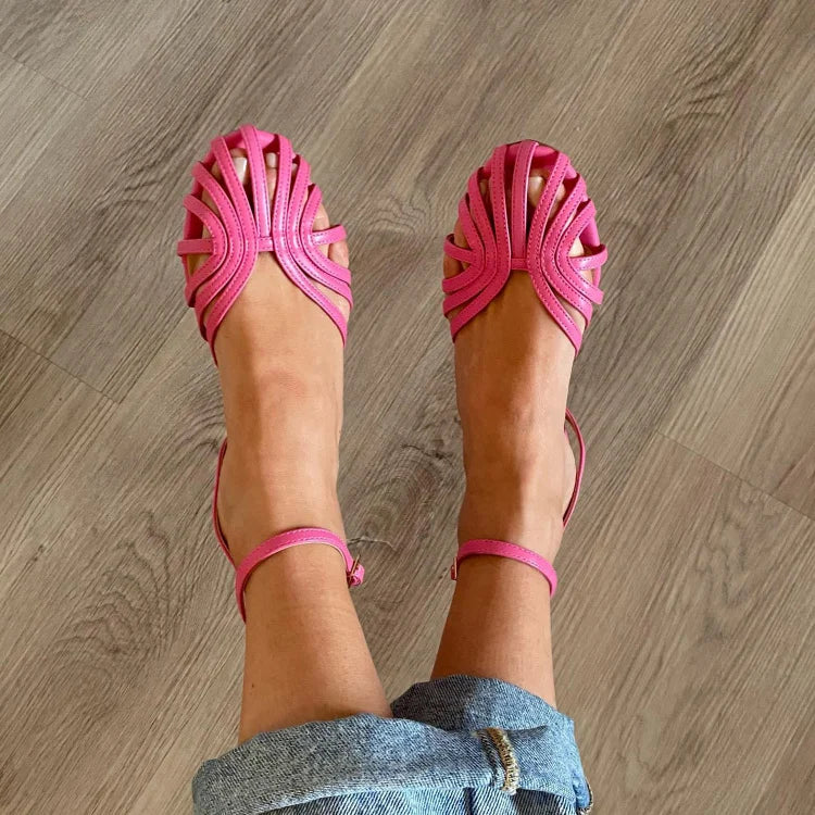 Pink cut-out ballet flats, close-up of fanned toe straps