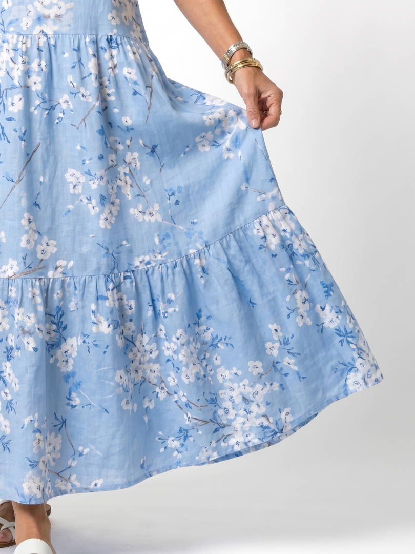 Alora floral print midi dress in blue, close-up of tiered skirt