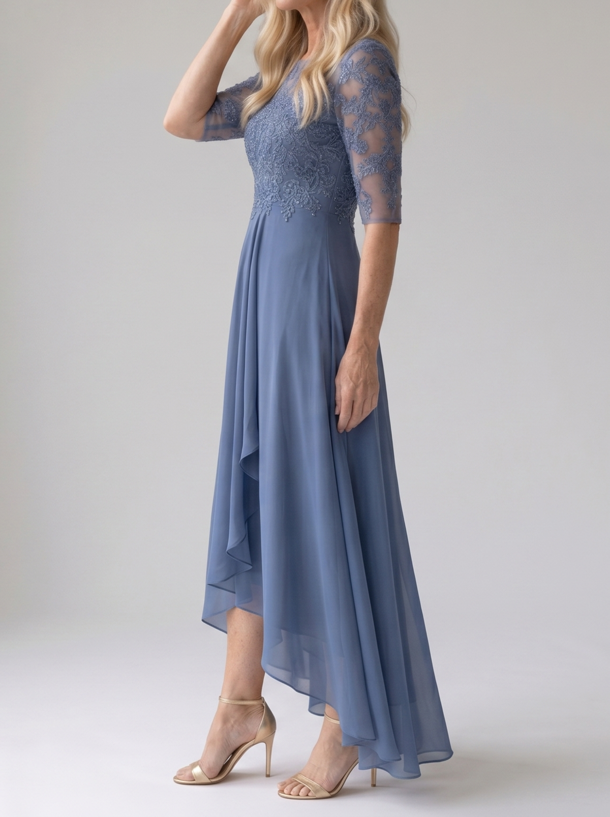 Rhonda lace dress in blue, side view showing hi-low chiffon skirt