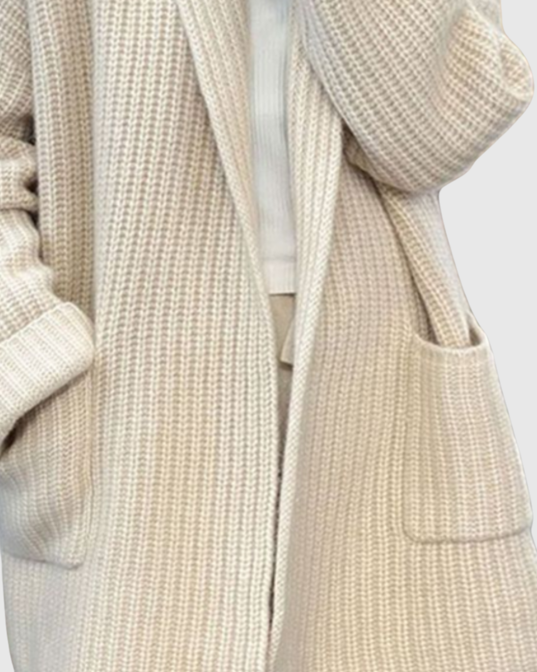 Mabel cardigan in cream, detail of shawl collar and patch pocket