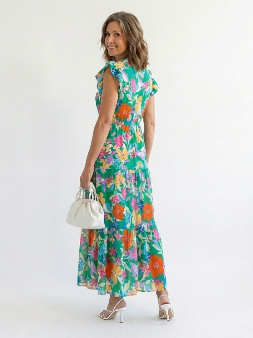 Lila floral midi dress in green, back view showing tiered skirt