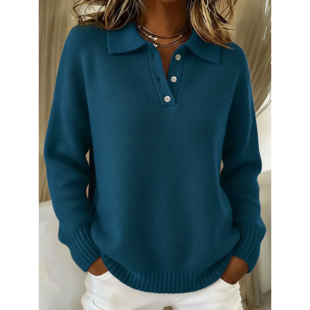 Marina soft polo jumper in teal, front view worn with white trousers