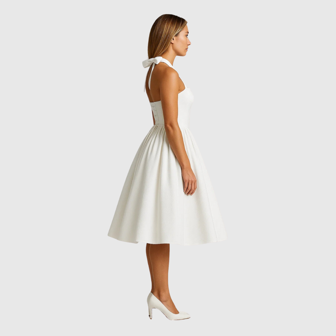 Verity halter midi dress in white, side view showing full skirt