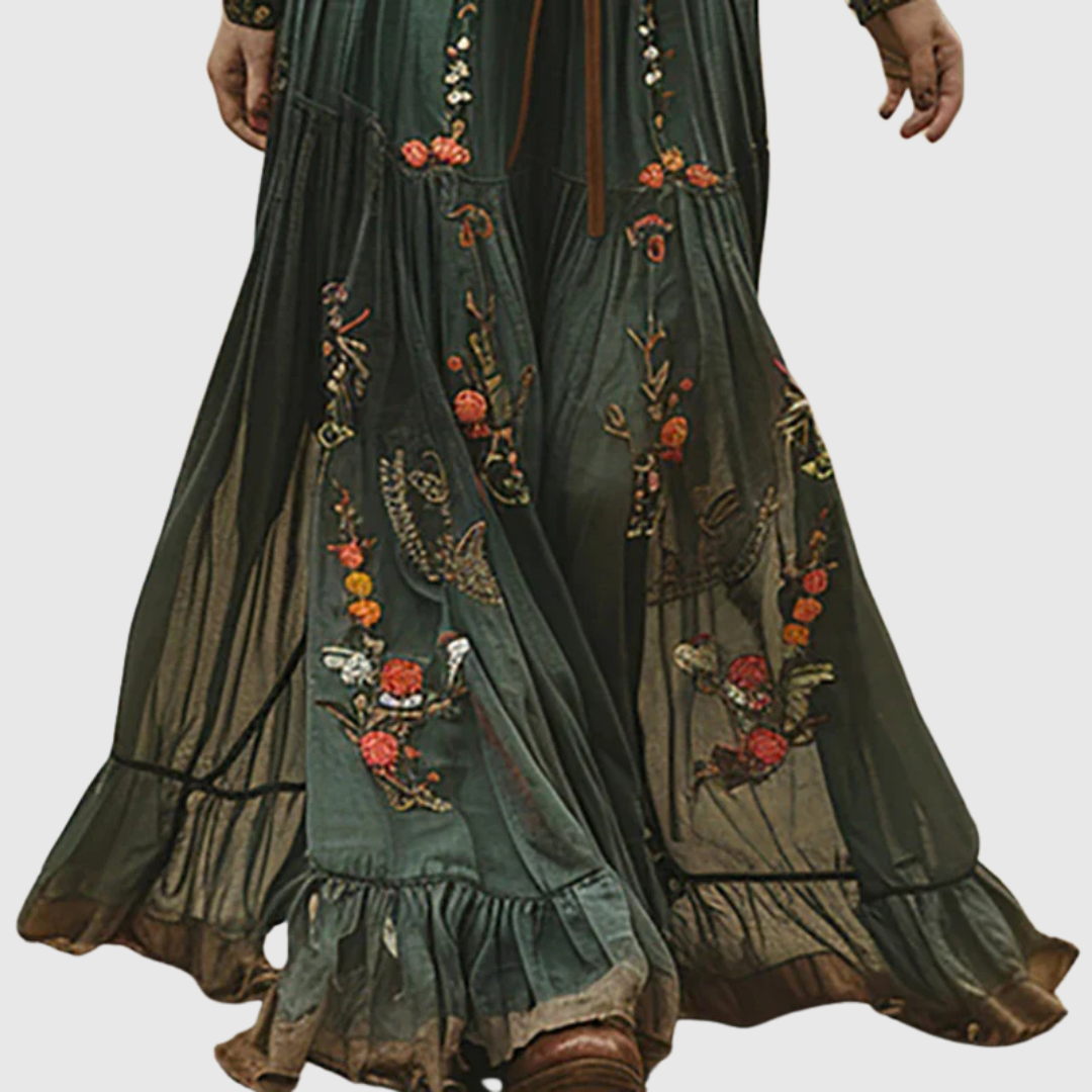 Alina Soleil maxi dress in green, close-up of embroidered ruffled hem