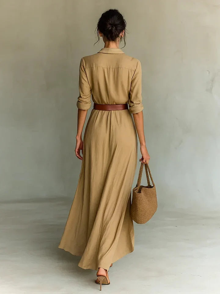 Una lapel-wrap maxi dress in khaki, back view showing draped skirt