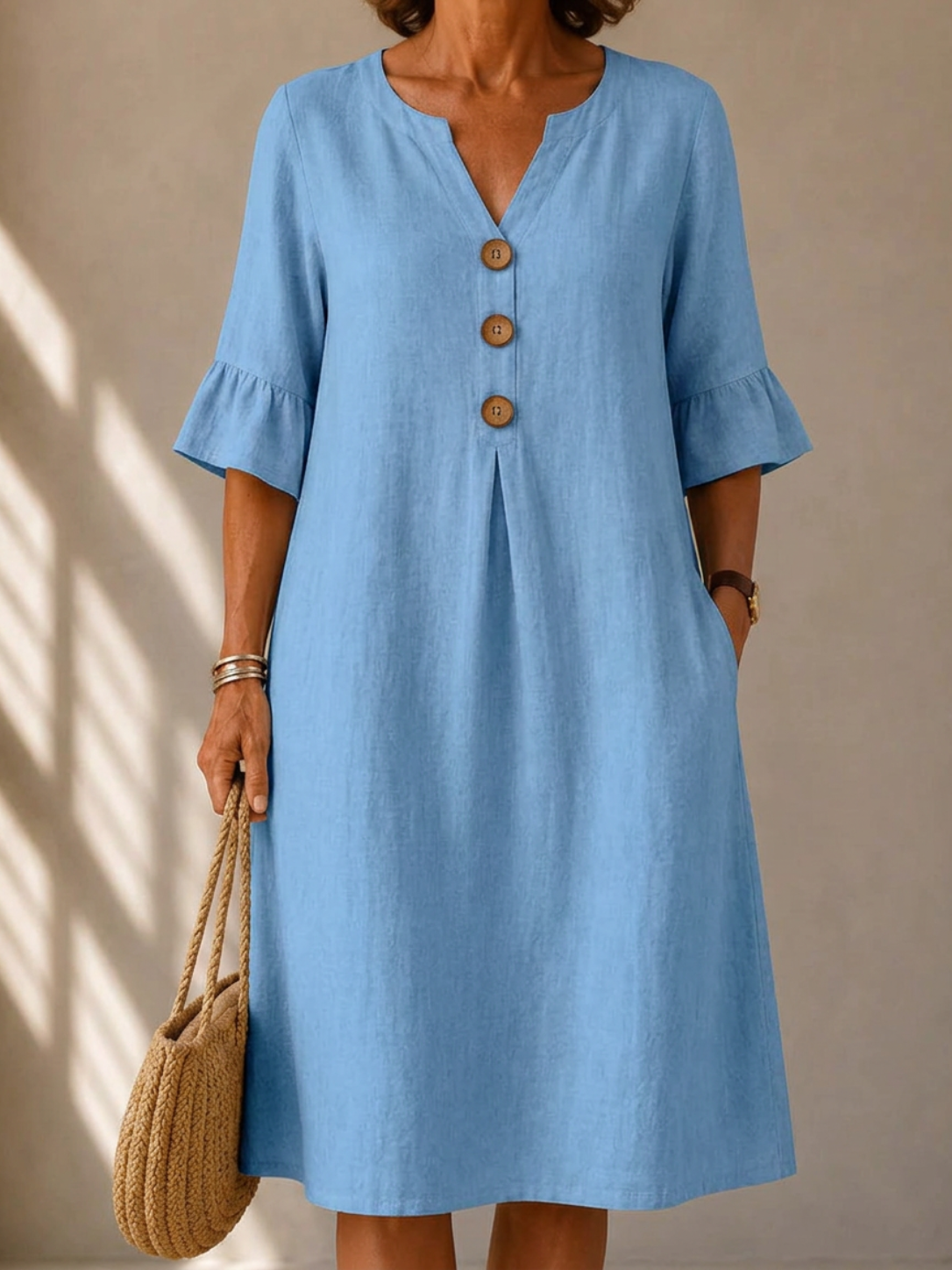 Charlotte buttoned gathered-front dress in sky blue, front view