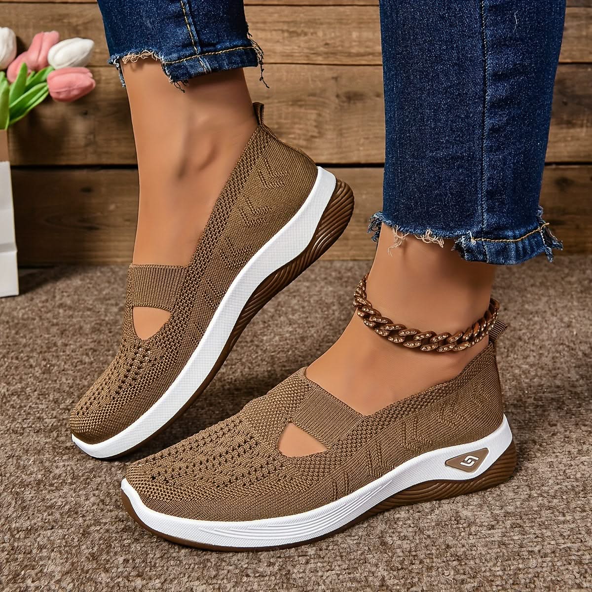 Elara slip-on sneakers in brown, worn side view