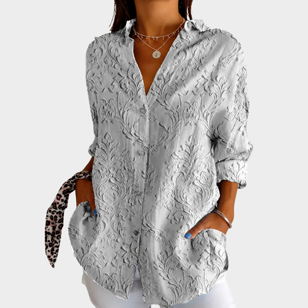Relaxed fit summer blouse in grey with textured floral pattern, front view