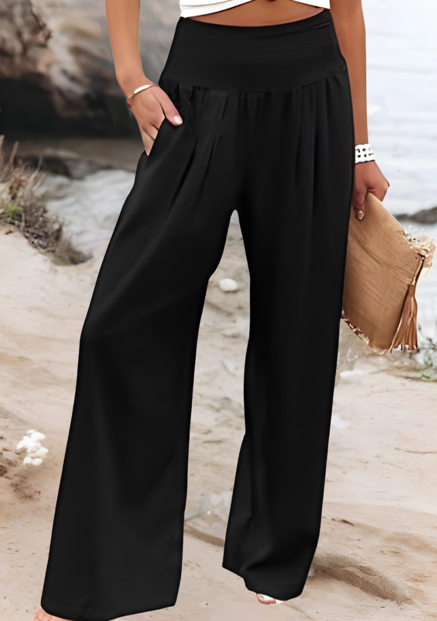 Annelise smocked waist trousers in black, full-length front view