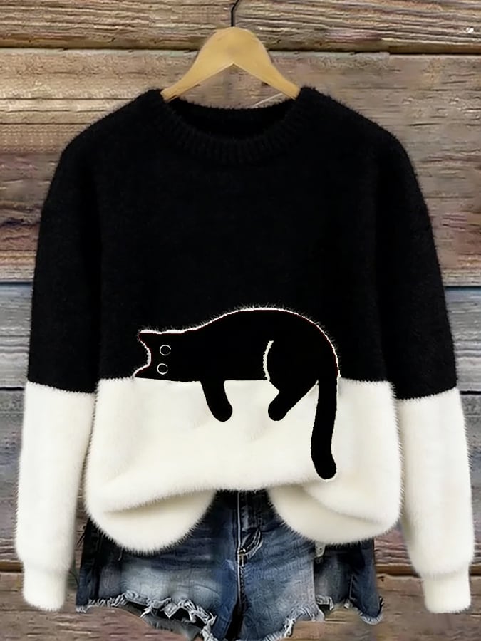 Aileen cat print oversized sweater in black and cream, front view