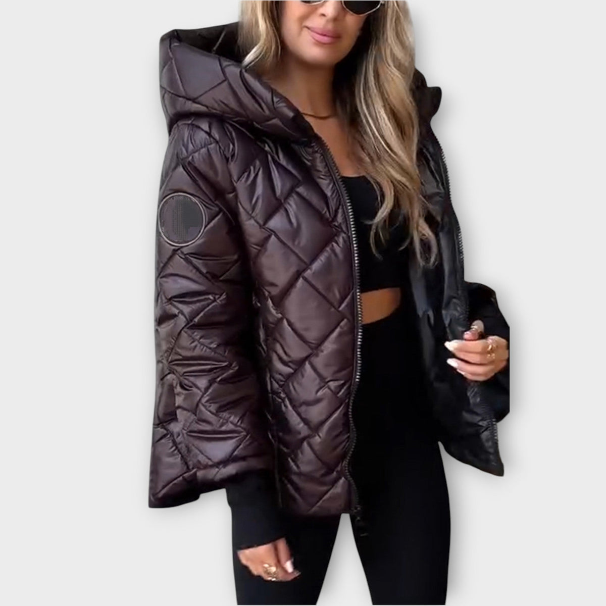 Winola hooded quilted jacket in red brown, front view with sleeve badge