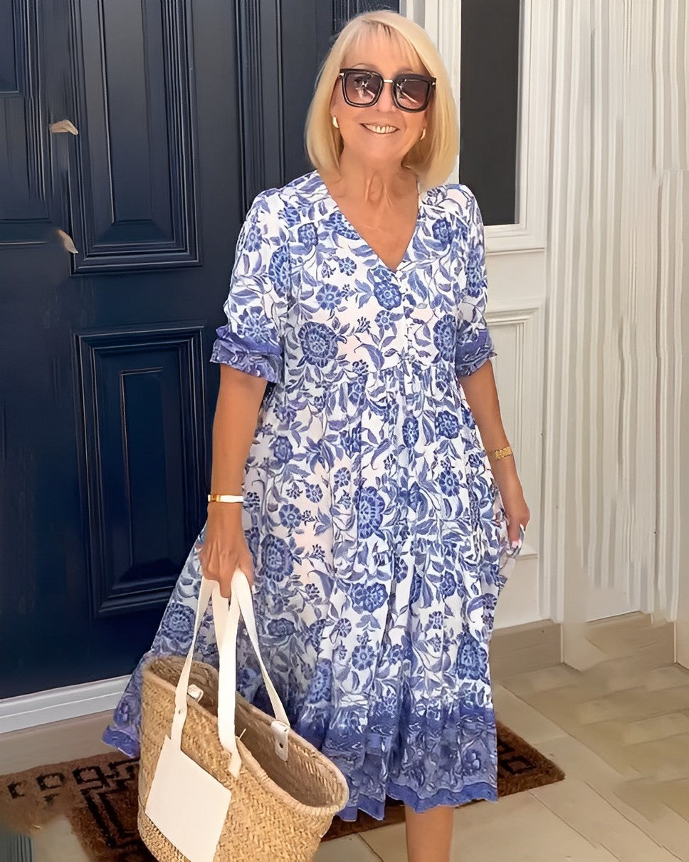 Keisha floral maxi dress in blue, front view showing tiered hem