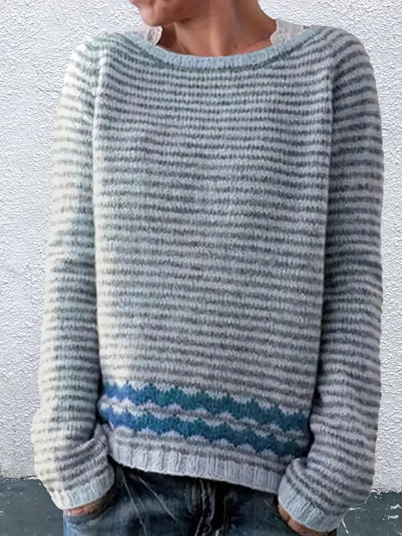 Kalyxe striped sweater in blue, front view worn with jeans