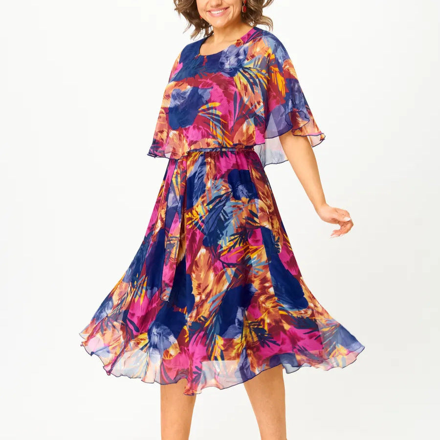 Barbara tropical print dress with flared skirt, side view