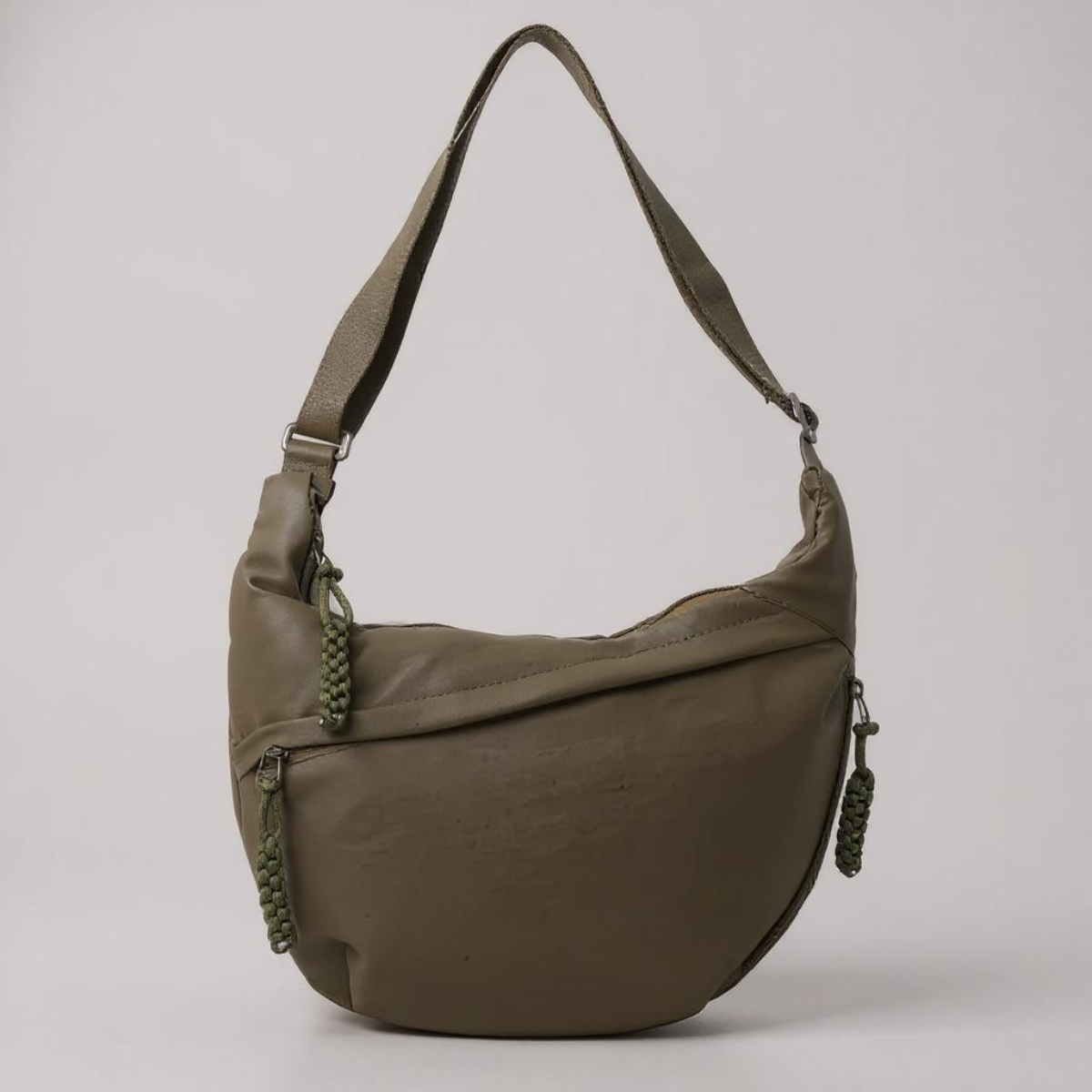 Florence crescent shoulder bag in olive green, front view with braided zip pulls